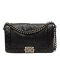 Chanel Medium Cuir de veau Boy Reverso à rabat