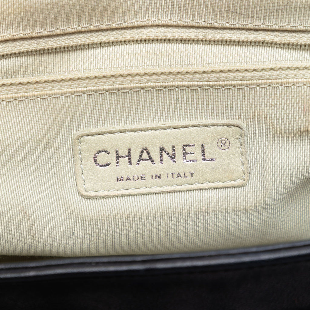 Chanel CC Matelassé Cuir d’agneau Sac rond à chaîne à rabat