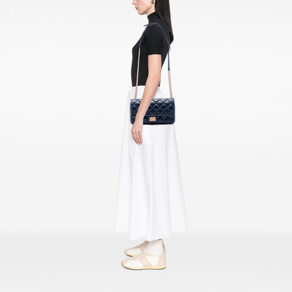 Chanel Matelassé vieilli Cuir de veau Reissue 2.55 Sac ceinture